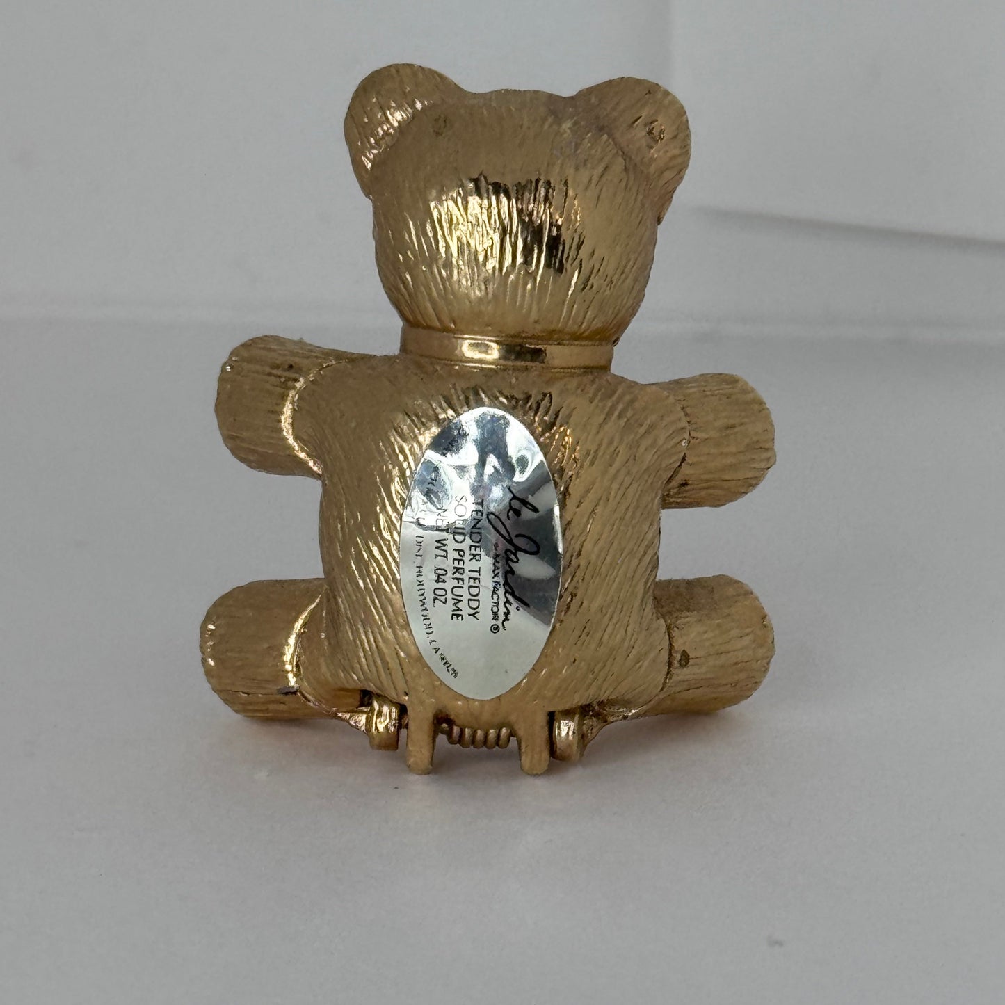 Vintage Max Factor “Le Jardin” Under Teddy Solid Perfume Brooch – Gold-Tone Bear with Blue Eyes 10/1