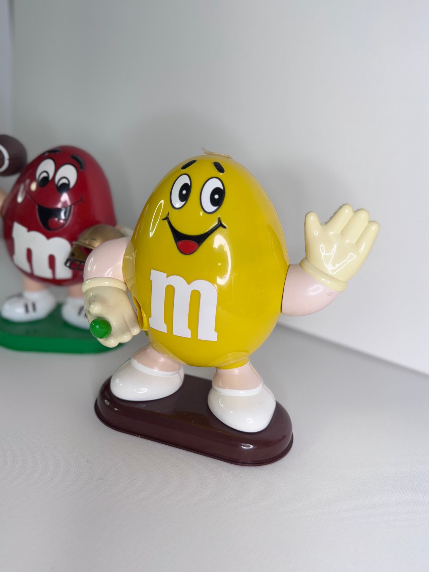 #38  Vintage M&M’s Candy Dispensers – Yellow Waving & Red Football Player Figure Set