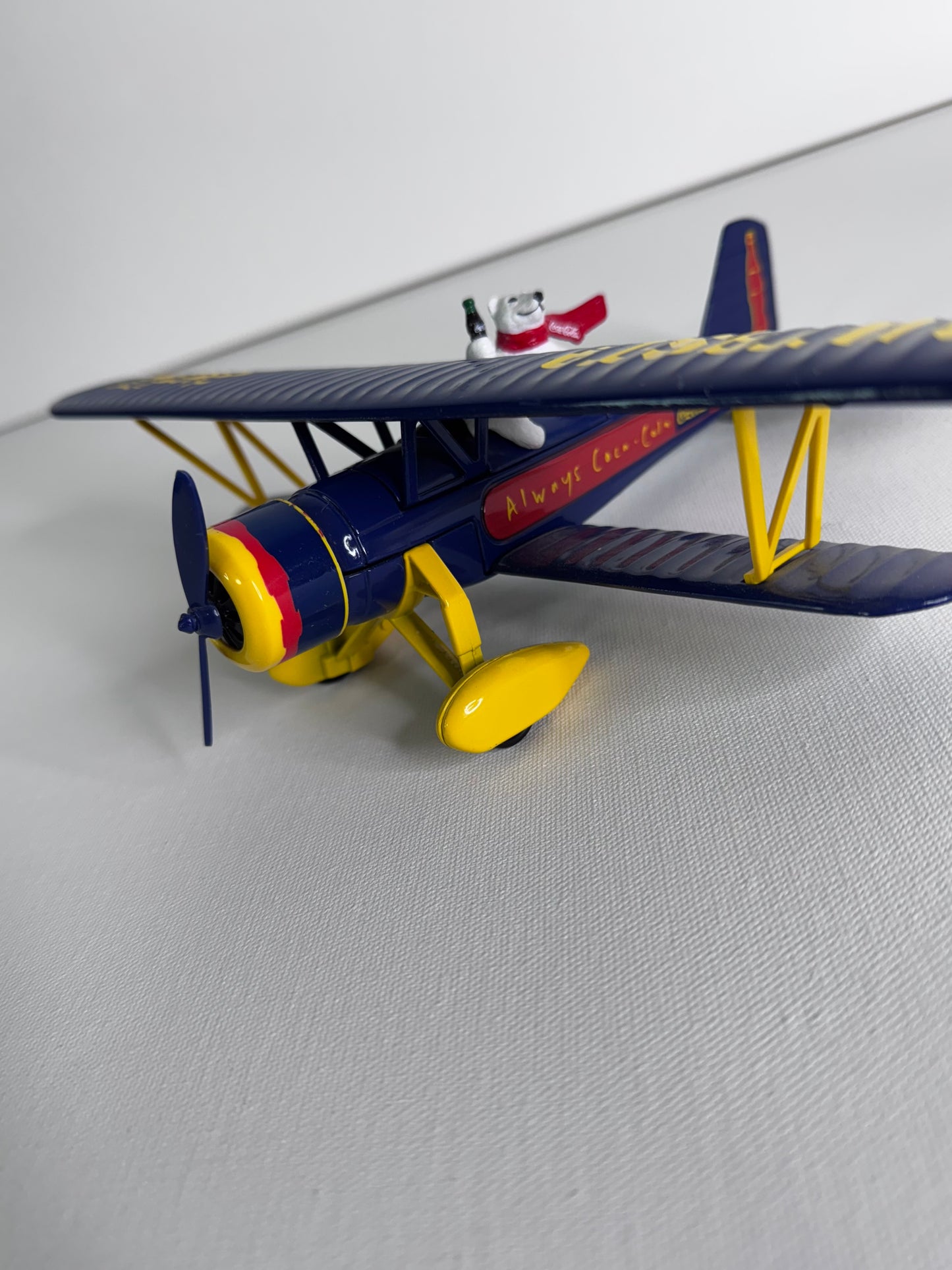 #35  Coca-Cola Polar Bear Biplane – Blue Die-Cast Metal Airplane