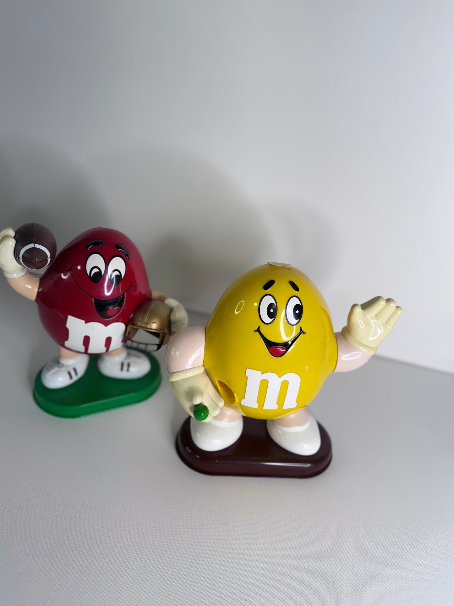 #38  Vintage M&M’s Candy Dispensers – Yellow Waving & Red Football Player Figure Set