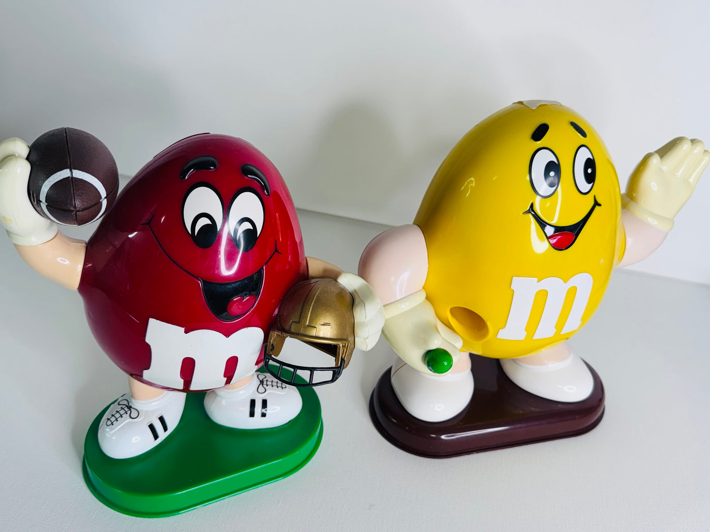 #38  Vintage M&M’s Candy Dispensers – Yellow Waving & Red Football Player Figure Set