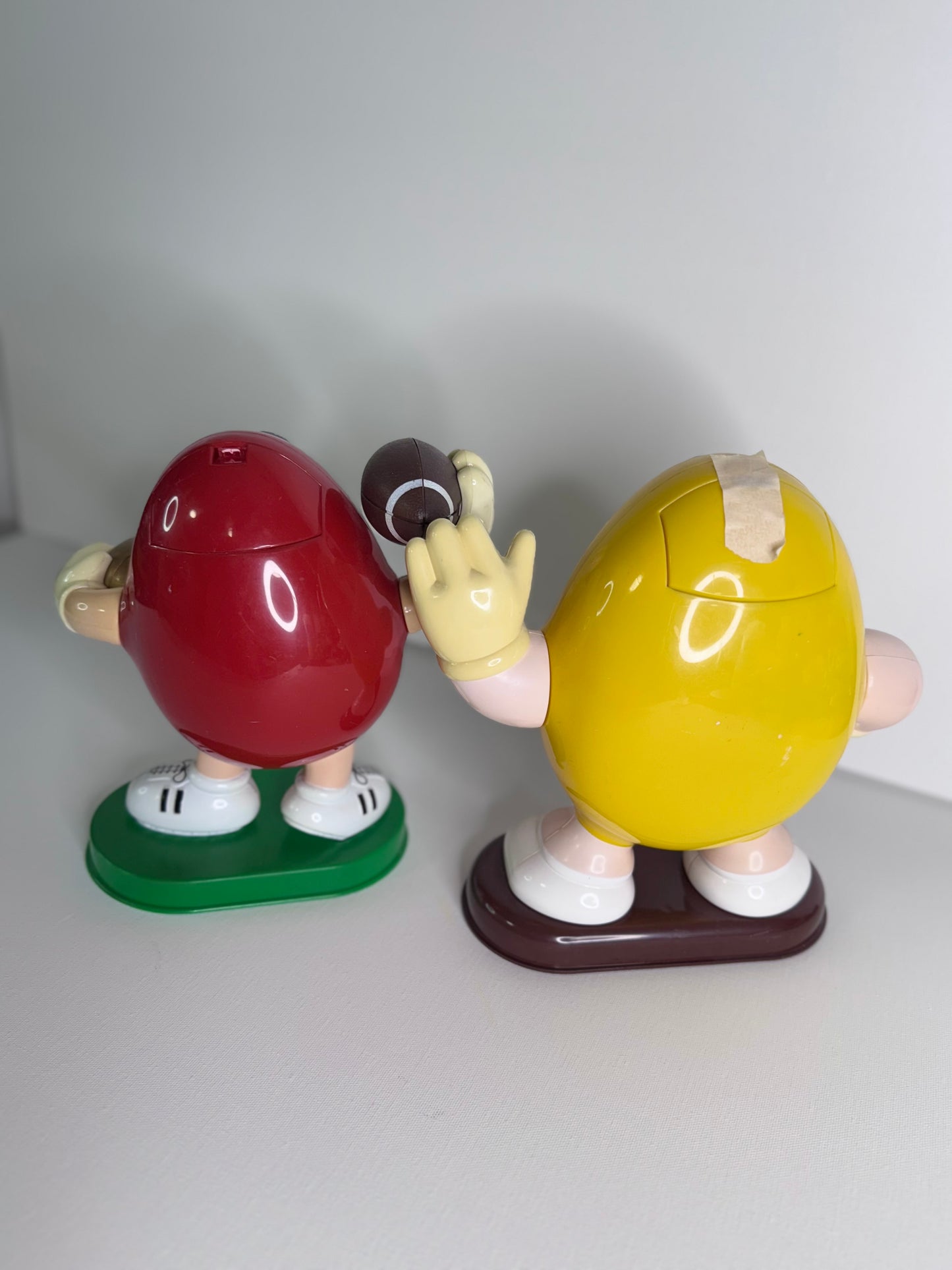 #38  Vintage M&M’s Candy Dispensers – Yellow Waving & Red Football Player Figure Set