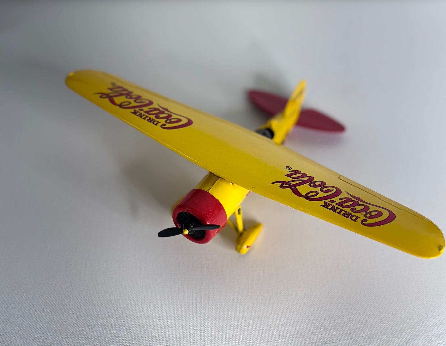 #36  Coca-Cola Yellow Die-Cast Airplane – Vintage Style Metal Display Plane